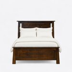 Front view of a transitional panel bed, showing cap rails, slim headboard cutouts and a low footboard on flared legs.