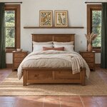 Front room view of a platform storage bed with a two-panel headboard, in a white bedroom with a terracotta tile floor.