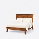 Diagonal angled view showing the left side of a Shaker panel bed, with a three-panel headboard and flared saber legs.