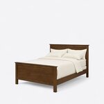 Diagonal angled view showing the left side of a transitional panel bed, with a flat-panel headboard and footboard.