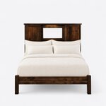 Front view of a Shaker bookcase bed, showing a wide three-bay headboard under a cap rail and a low footboard on square legs.