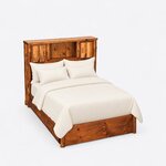High angled view of a rustic bookcase bed, looking down on the cubby headboard, wide plank cap and solid low footboard.