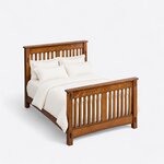 High angled view of a Mission slat bed, looking down on the high slatted footboard, wide side rails and square legs.