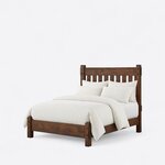 Diagonal angled view showing the left side of a Mission slat bed, with a slatted headboard and a low pegged footboard.