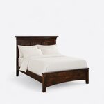 Diagonal angled view showing the right side of a classic panel bed, with a crowned headboard and a low arched footboard.