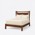 Diagonal angled view showing the left side of a modern panel bed, with a floating panel headboard and a low footboard.