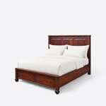 Diagonal angled view showing the left side of a classic storage bed, with a three-panel headboard and two footboard drawers.