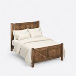 High angled view of a rustic panel bed, looking down on the tall headboard, the braced footboard and square legs.