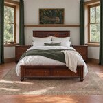 Front room view of a traditional storage bed with two footboard drawers, in a terracotta-tiled bedroom with tall windows.