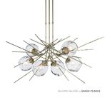 Modern Brass Hubbardton Forge Griffin Pendant on White Background