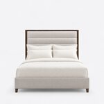 Front view of a modern upholstered bed, showing a tall horizontally channeled headboard and a low upholstered footboard.