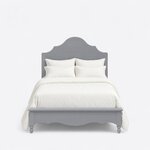 Front view of a farmhouse panel bed, showing a scalloped headboard and a low footboard with a curved apron on turned feet.