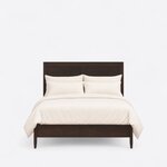 Front view of a minimalist panel bed, showing a tall flat-topped two-panel headboard and a low footboard on tapered legs.