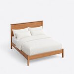 High angled view of a mid-century panel bed, looking down on the capped headboard, straight side rails and low footboard.