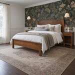 Diagonal angled room view showing the left side of a transitional panel bed with square legs, in a floral wallpaper bedroom.