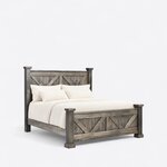 Diagonal angled view showing the right side of a rustic panel bed, with V-braced plank panels and capped square posts.