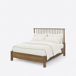 Diagonal angled view showing the left side of a Windsor spindle bed, with a spindle headboard and a low solid footboard.