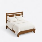 High angled view of a farmhouse panel bed, looking down on the side rails, low footboard and tapered square legs.