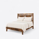 Diagonal angled view showing the left side of a farmhouse panel bed, with an open grid headboard and a low footboard.