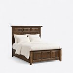 Diagonal angled view showing the right side of a mantel panel bed, with a tall paneled headboard and three-panel footboard.