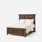 Diagonal angled view showing the left side of a mantel panel bed, with a tall paneled headboard and three-panel footboard.