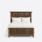 Front view of a mantel panel bed, showing a crown-molded mantel cap and a low raised-panel footboard with an arched apron.
