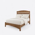 Diagonal angled view showing the left side of a modern slat bed, with an arched slatted headboard and a low footboard.
