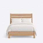 Front view of a minimalist slat bed, showing a tall flat-topped slatted headboard and a low solid footboard on square legs.