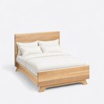 High angled view of a contemporary panel bed, looking down on the slab footboard, deep side rails and splayed corner feet.