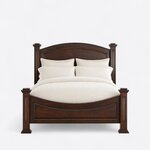 Front view of a traditional poster bed, showing an arched panel headboard, a curved panel footboard and capped square posts.