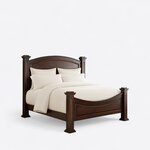 Diagonal angled view showing the right side of a traditional poster bed, with an arched headboard and a curved footboard.