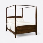Diagonal angled view showing the right side of a classic canopy bed, with tapered square posts and a solid footboard.