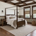 Diagonal angled room view showing the right side of a classic canopy bed with tapered posts, in a beamed Craftsman bedroom.