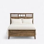 Front view of a contemporary panel bed, showing a lattice band over three recessed panels and a low solid footboard.