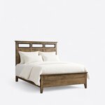Diagonal angled view showing the right side of a contemporary panel bed, with open headboard inserts and a low footboard.