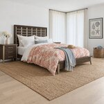 Diagonal angled room view showing the right side of a modern slat bed with a metal-barred headboard, in a coastal bedroom.