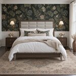 Front room view of a modern upholstered bed with a grid headboard, in a bedroom with floral wallpaper over wainscoting.