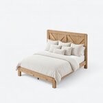 High angled view of the Fulton bed, with a straight side rail linking a tall headboard to a low foot rail.