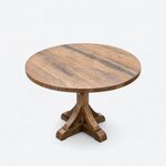 High angled view of a rustic dining table, with a circular top, a straight slab edge and a cross-shaped base.