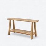 Diagonal angled view showing the left side of a farmhouse console table, with a lower shelf and paired splayed legs.