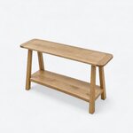 High angled view of a farmhouse console table, showing a narrow rounded-corner top above a rectangular lower shelf.