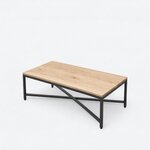 High angled view of an industrial coffee table, with a long rectangular top above a horizontal metal X-brace.