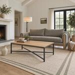 Diagonal angled room view showing the left side of an industrial coffee table with a thin top, in a farmhouse living room.