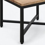 Leg close-up of an industrial end table, showing a square metal leg, a round floor glide and a low stretcher joint.
