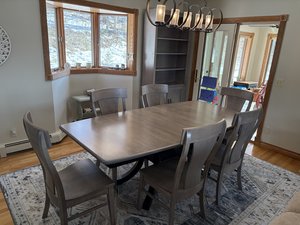 solid wood dining chairs around amish dining table