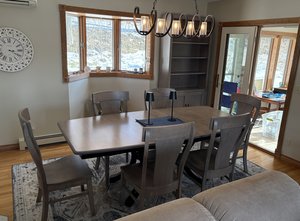 wood dining chairs around solid wood dining table
